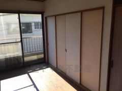 押入